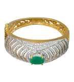 Gold Toned Bangle with Green Stone