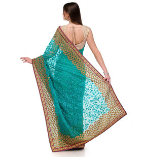 Turquoise Net Saree with Swarovski Work